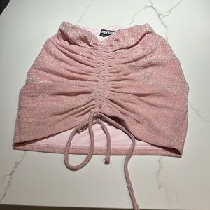 Crunched front shiny mini skirt